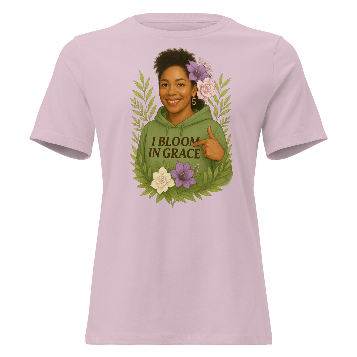 Women's relaxed-fit I Bloom In Grace Exclusive Tee with a smiling woman in a green hoodie framed by flowers and leaves, front view