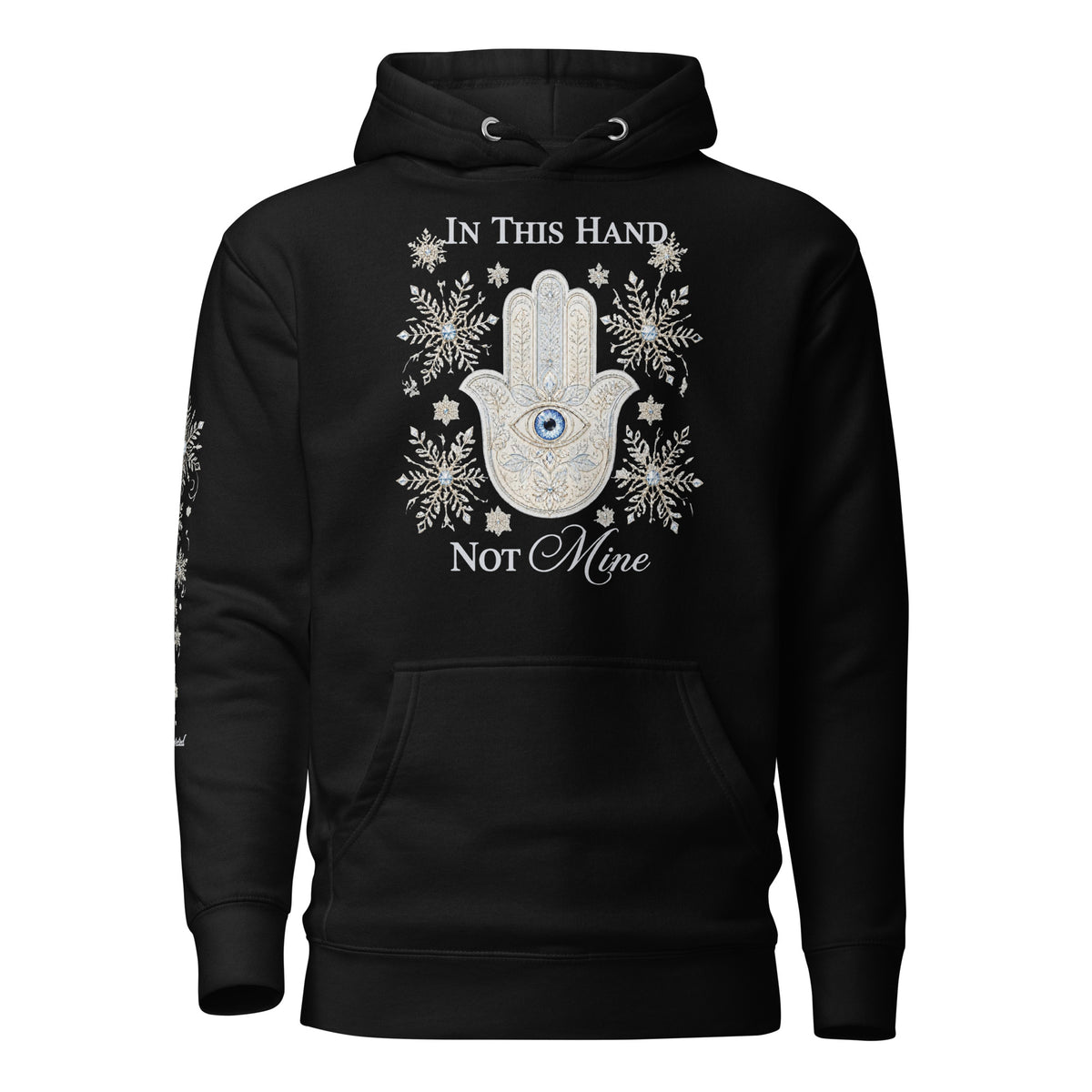 Black hoodie with a silver jeweled hamsa, crystal snowflakes, and the words In This Hand, Not Mine on the front